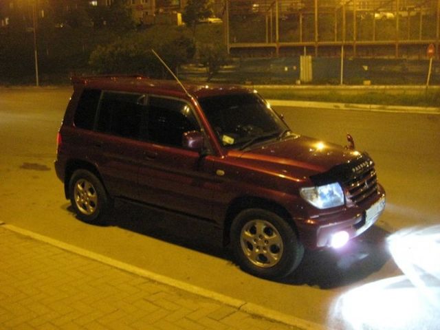 Pajero iO.  2009 