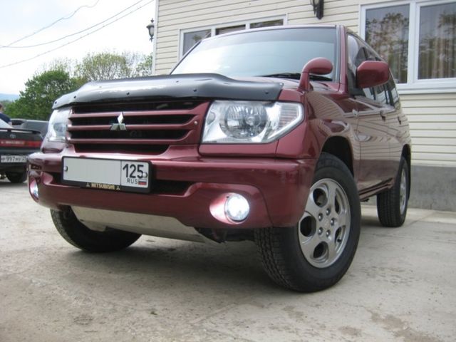 Pajero iO.  2009 